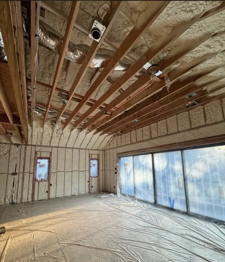 Interior walls and ceiling insulated with spray foam during new construction in Easton